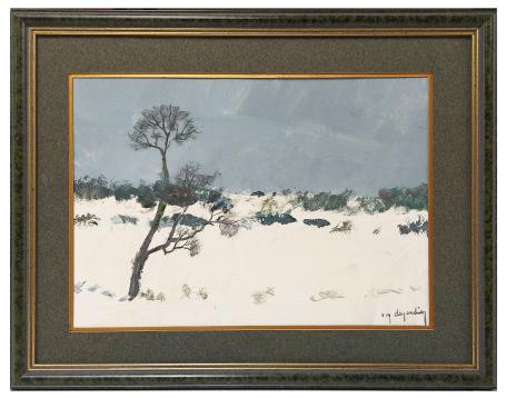 Eénzame boom in de sneeuw