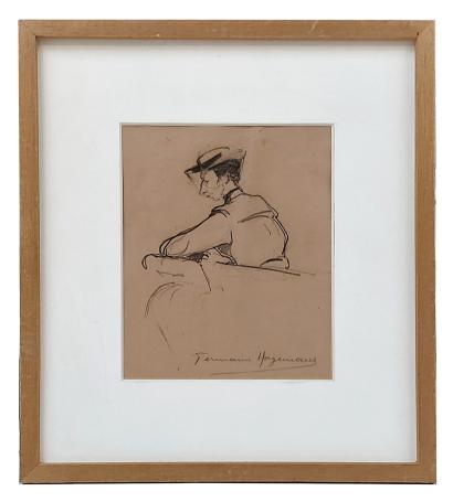 Dame met hoedje op een bank