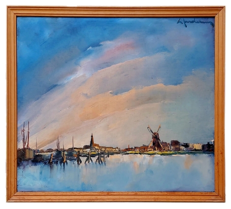 Dorpje met windmolen aan het water