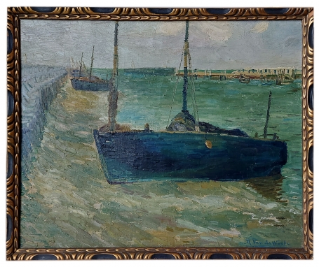 Bootjes op het zand bij laagtij